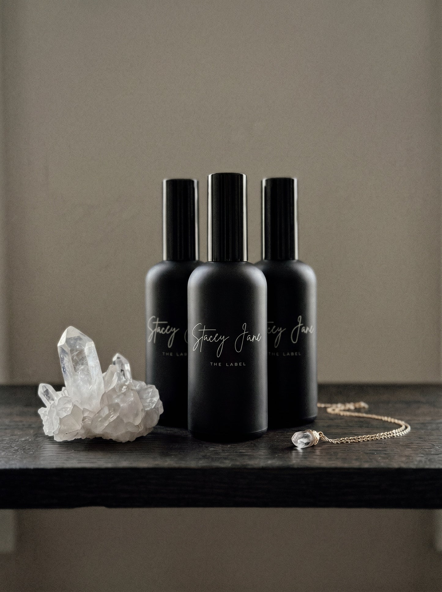 Stacey Jane PENTHOUSE FRAGRANCE Dream Crown Towers spritzer spray bottle with elegant floral design and gold accents.
