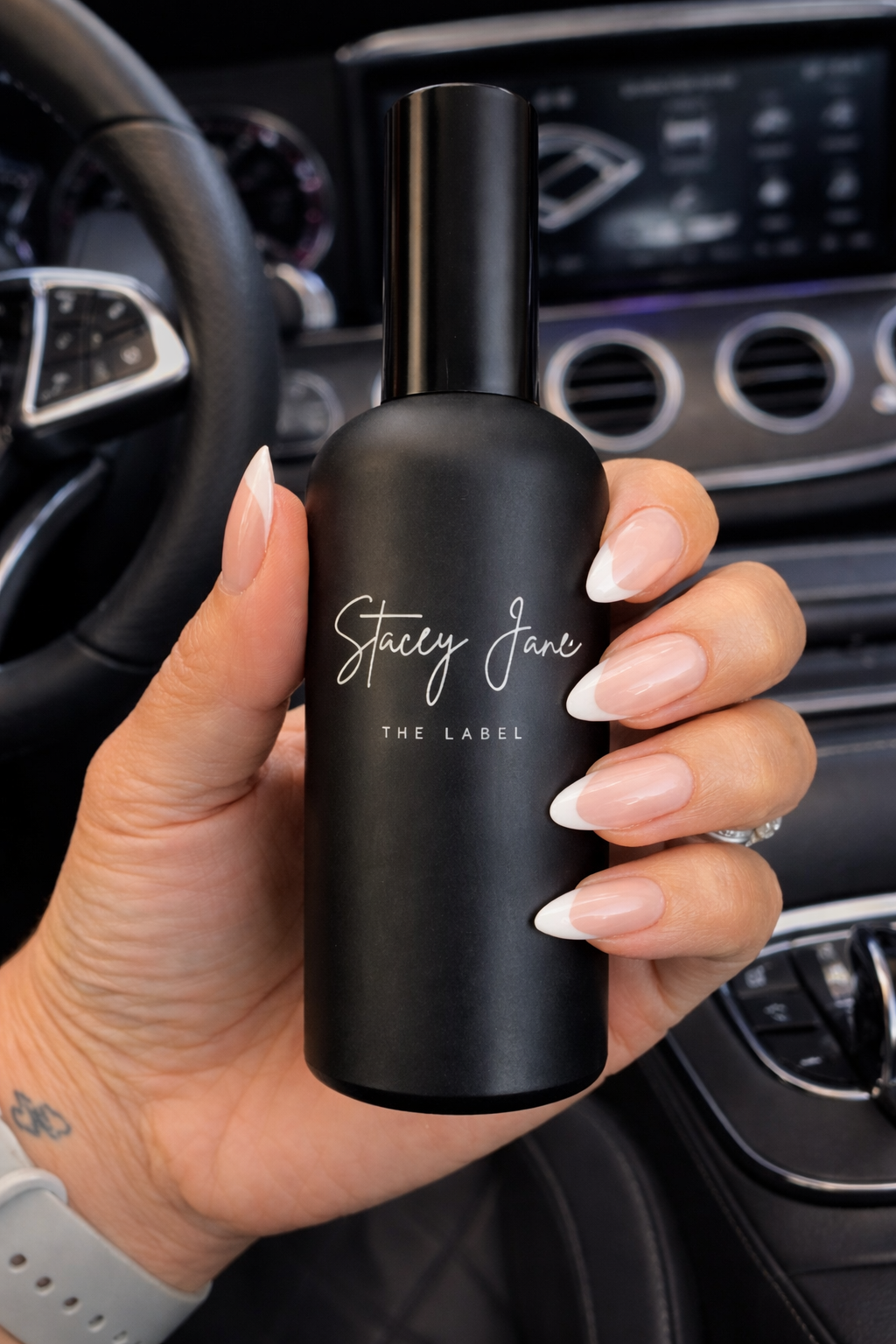 Stacey Jane PENTHOUSE FRAGRANCE Dream Crown Towers spritzer spray bottle with elegant design and floral accents.