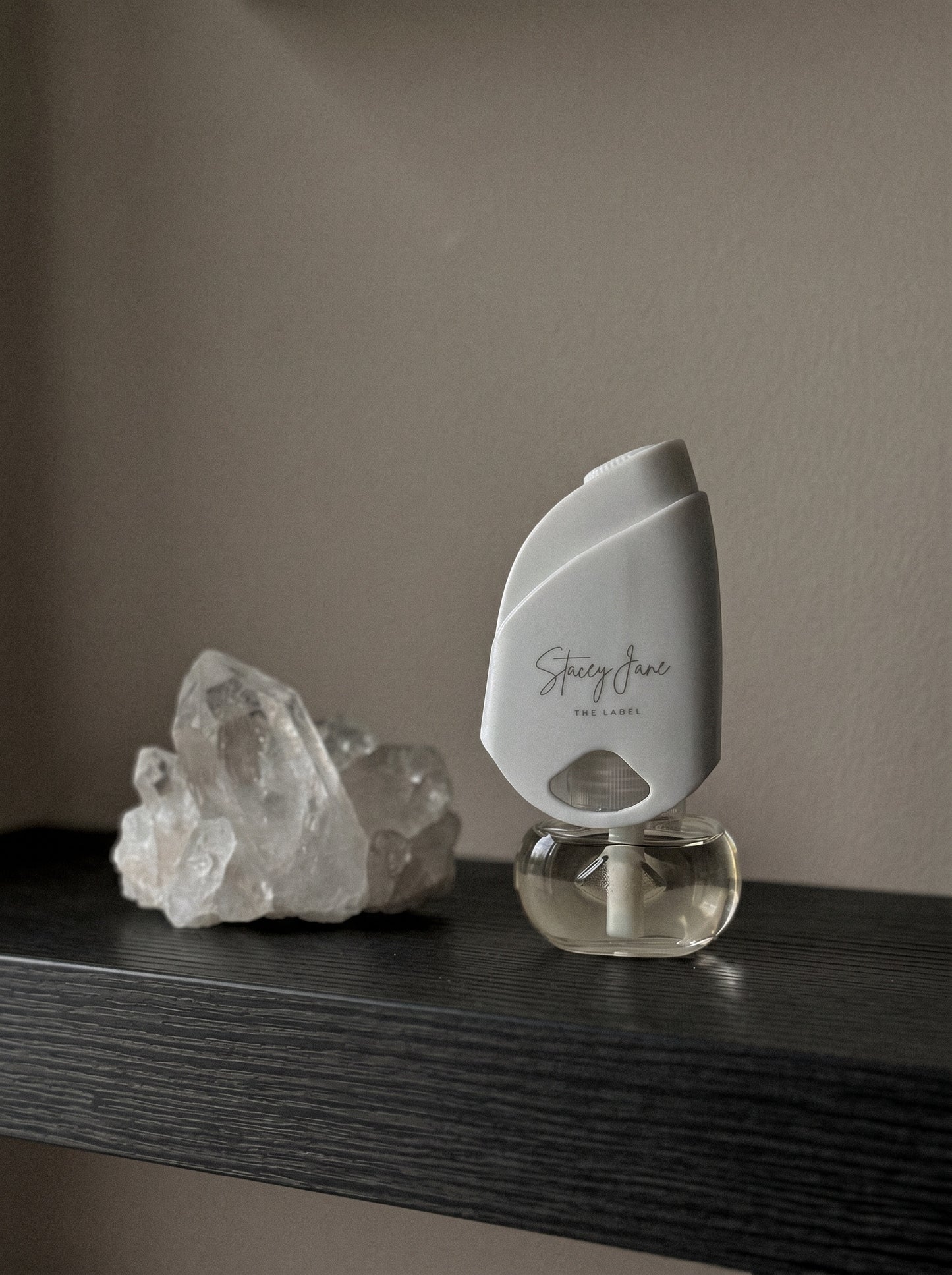 Stacey Jane 24/7 Lux Diffuser emitting soft light with sleek white design and mist output, room decoration and aromatherapy accessory