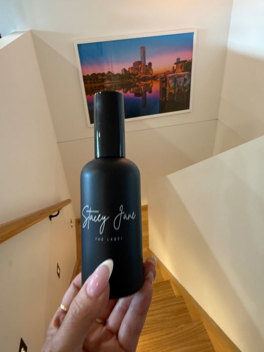 Stacey Jane Sun Kissed Fragrance Spritzer Spray with Brazilian Bum Bum scent in a clear bottle, ready for pre-order.