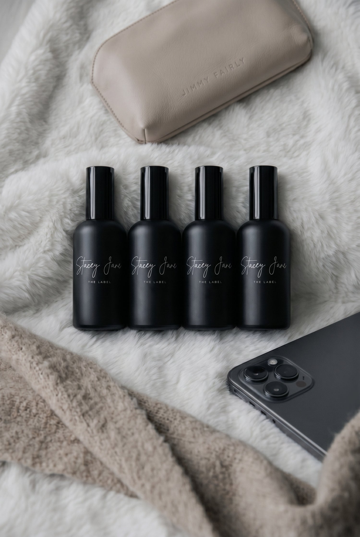 Stacey Jane PENTHOUSE FRAGRANCE Dream Crown Towers spritzer spray bottle with elegant design and fragrance label visible.