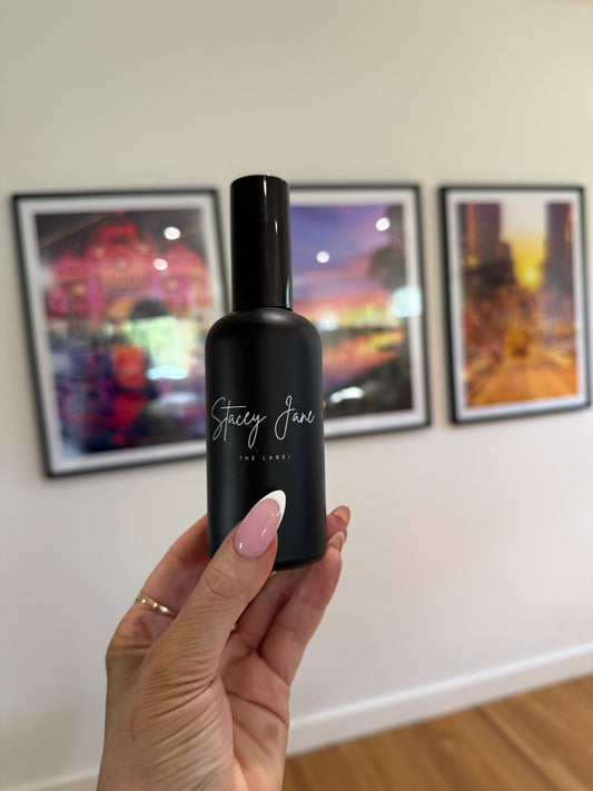 Stacey Jane Sun Kissed Fragrance Spritzer Spray with Brazilian Bum Bum scent, showing the sleek perfume bottle and label.