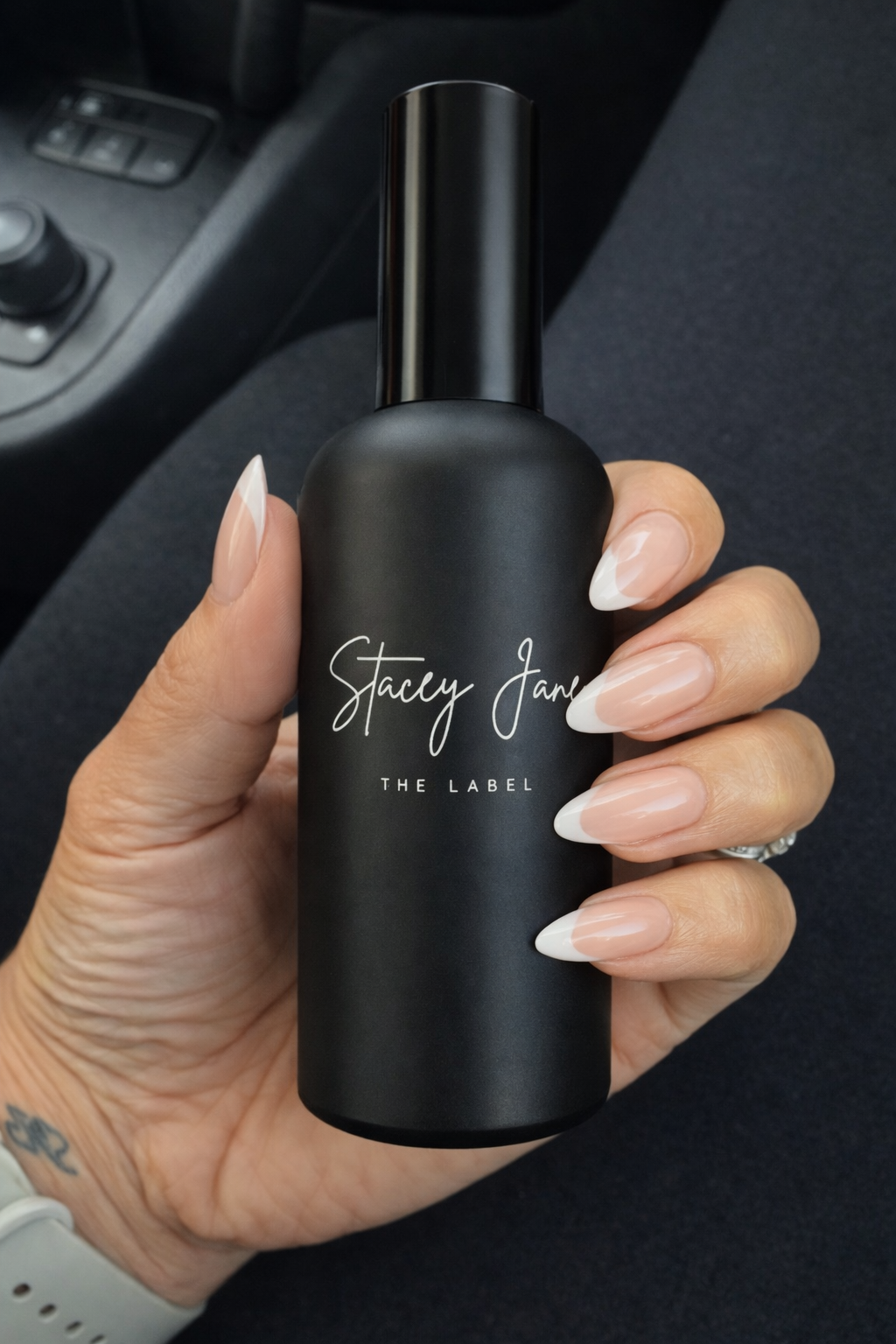 Stacey Jane Penthouse Fragrance Dream Crown Towers spritzer spray bottle with floral and citrus scent design.