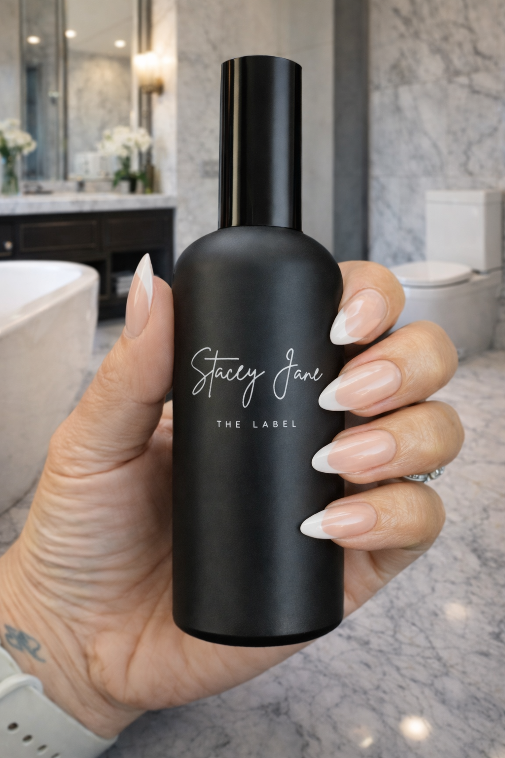 Stacey Jane PENTHOUSE FRAGRANCE Spritzer Spray with Dream Crown Towers design, featuring a sleek perfume bottle and decorative cap.