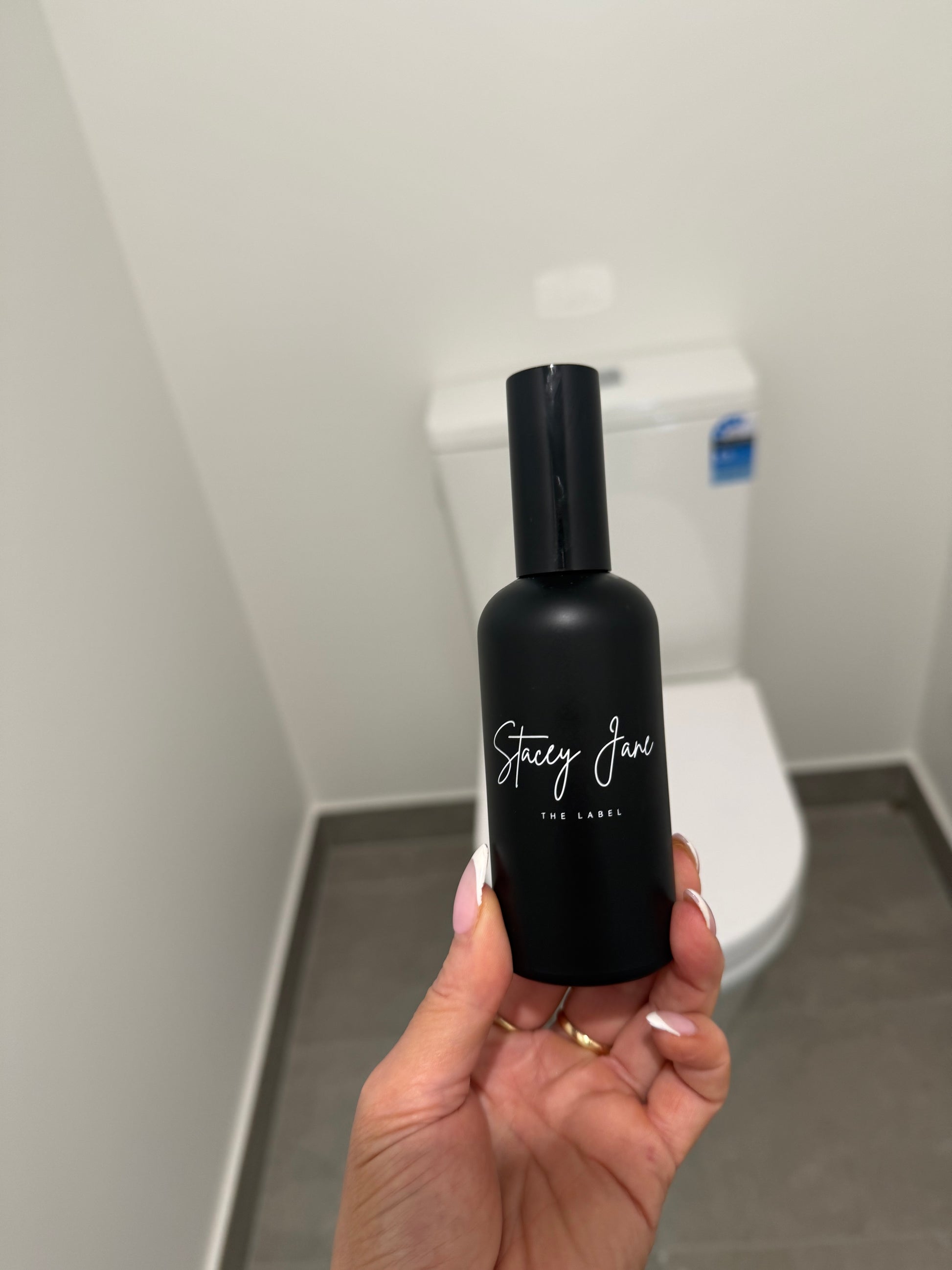 Stacey Jane Penthouse Fragrance Spritzer Spray featuring a sleek bottle with a luxurious, elegant design for the Dream Crown Towers.