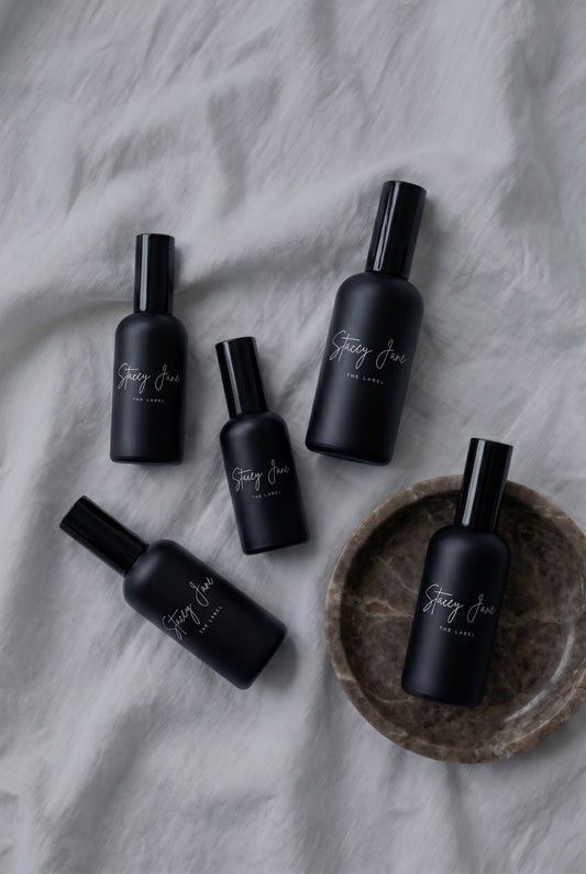 Stacey Jane PENTHOUSE FRAGRANCE Spritzer Spray with Dream Crown Towers design, featuring a sleek perfume bottle with a spray nozzle.