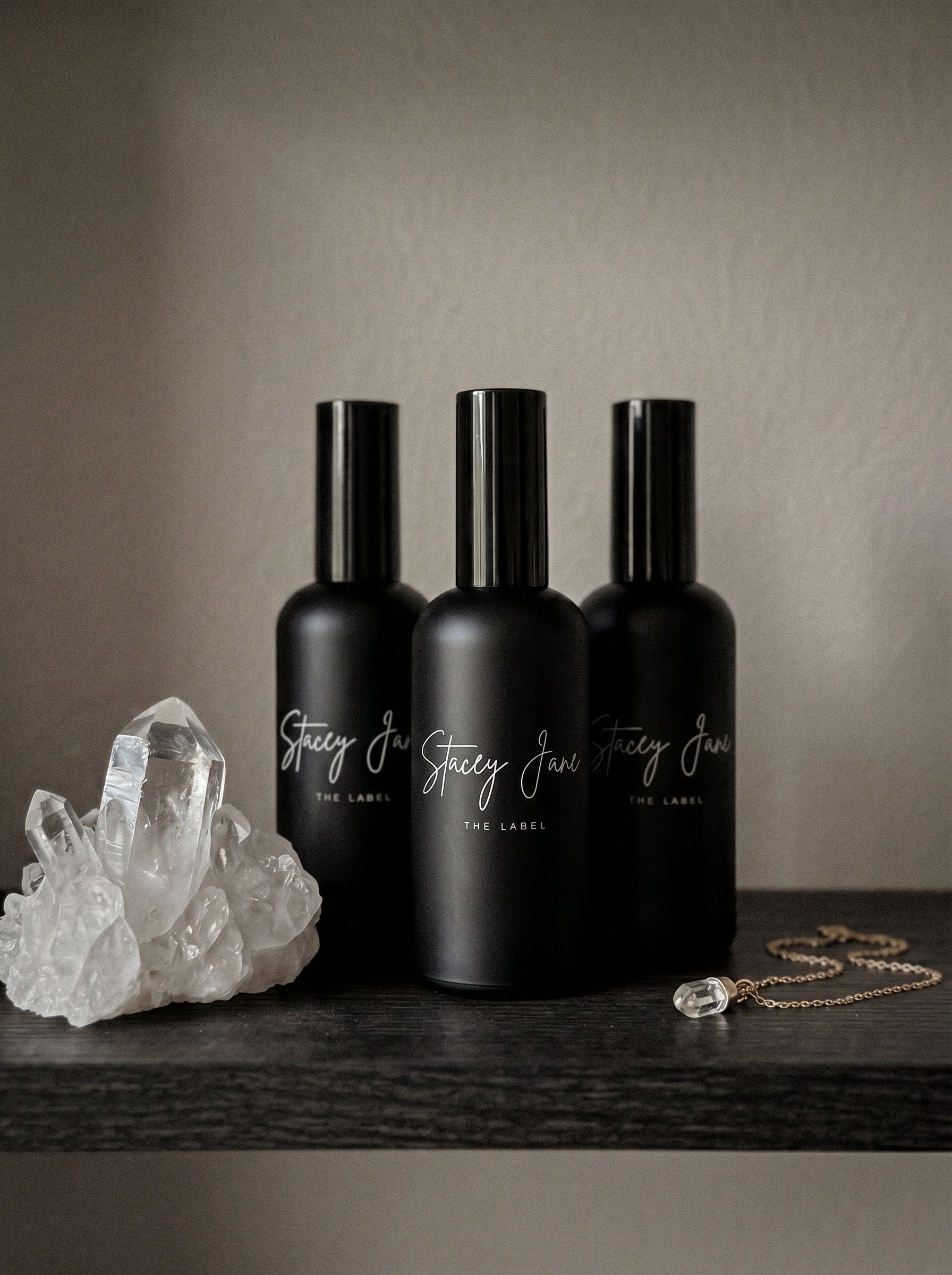 Stacey Jane PENTHOUSE FRAGRANCE Dream Crown Towers spritzer spray bottle with elegant label and cap, close-up shot.