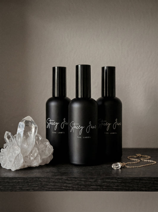 Stacey Jane PENTHOUSE FRAGRANCE Dream Crown Towers spritzer spray bottle with elegant label and cap, close-up shot.