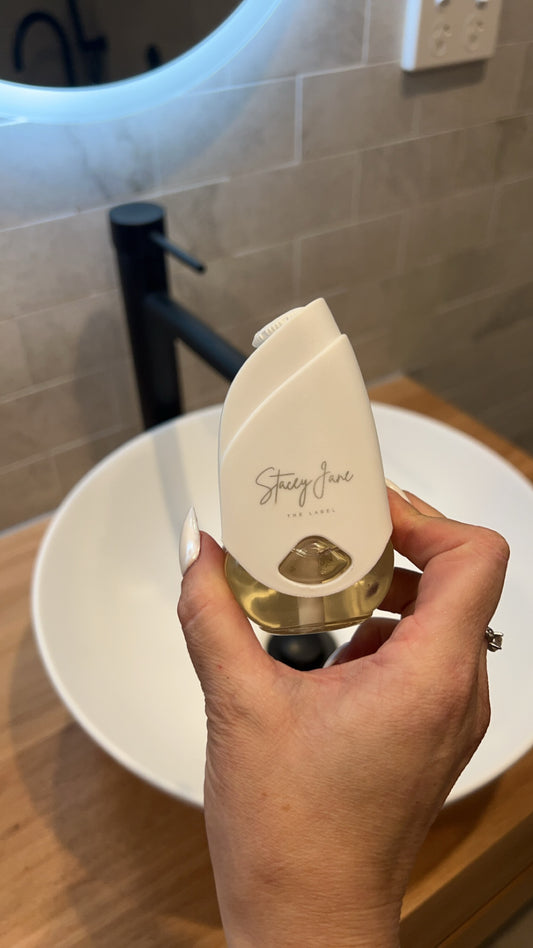 Stacey Jane Ember fragrance pod in Santal 33 scent, featuring a sleek black pod with subtle branding and a minimalist design.