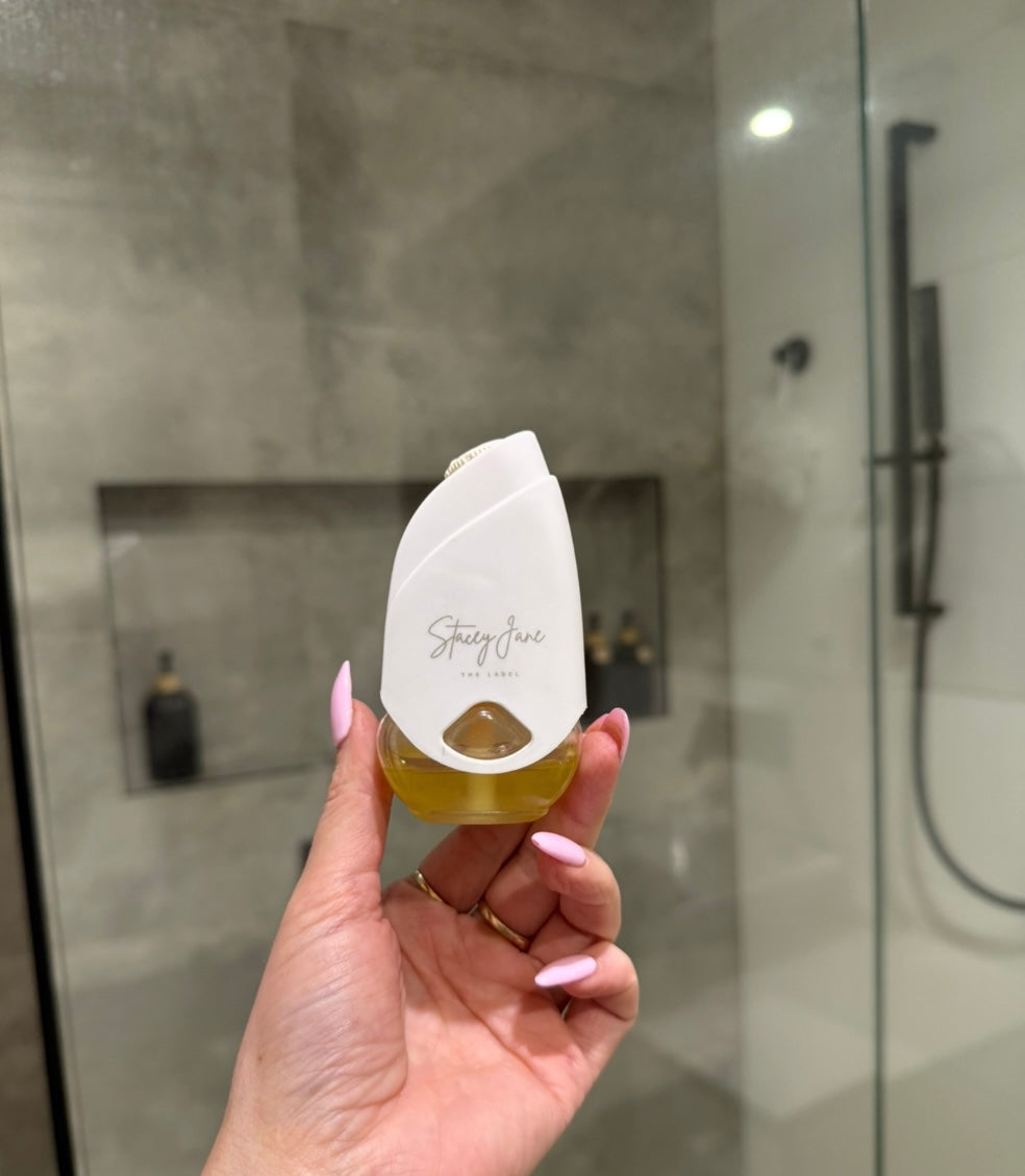 Stacey Jane Lux diffuser and fragrance pod bundle with sleek diffuser and matching scented pods for home aromatherapy.